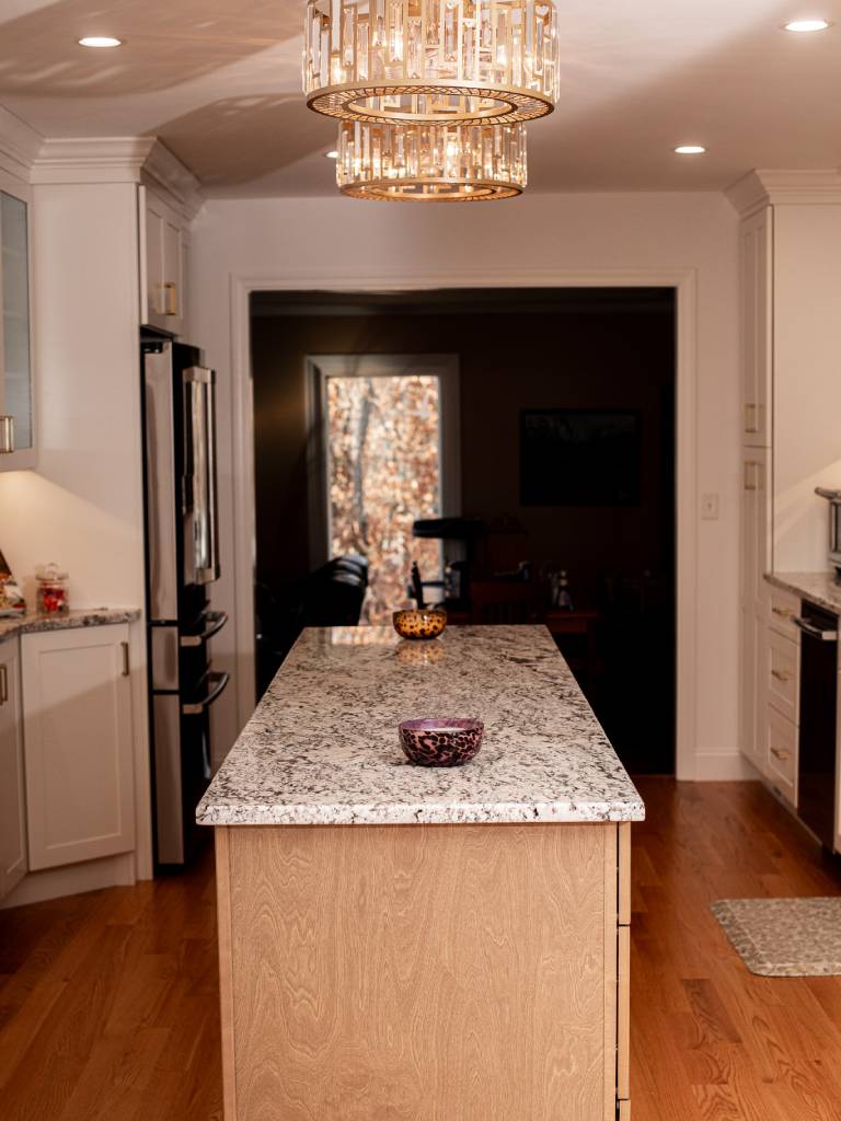 The new kitchen layout included opening up the interior doorway to the den.